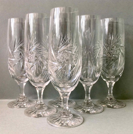 Image 1 of Set van 7 geslepen kristallen champagneflessen