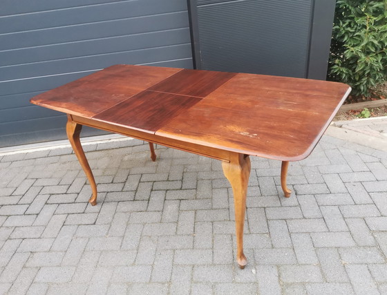 Image 1 of Mid Century stoelen en uitschuiftafel