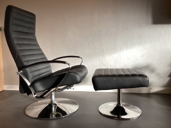 Image 1 of BoConcept Wing draai fauteuil met voetenbank