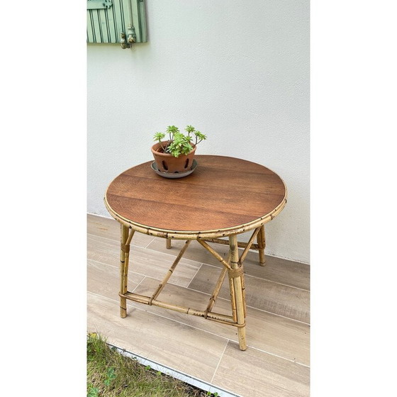 Image 1 of Ronde vintage salontafel van rotan en eiken