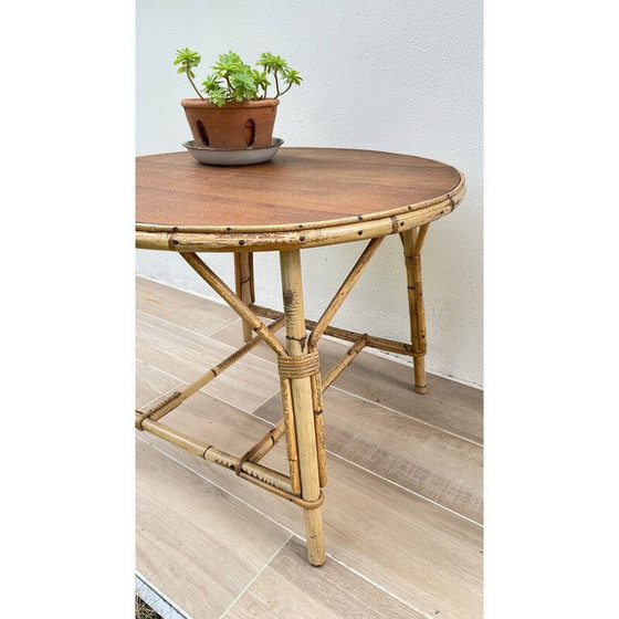 Image 1 of Ronde vintage salontafel van rotan en eiken