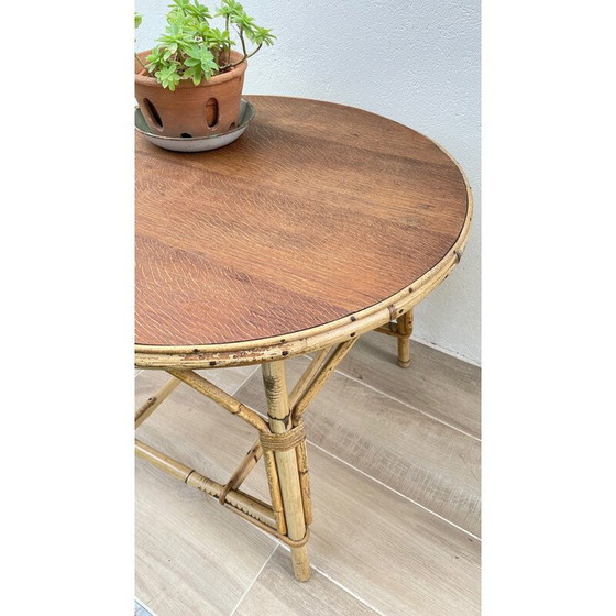 Image 1 of Ronde vintage salontafel van rotan en eiken