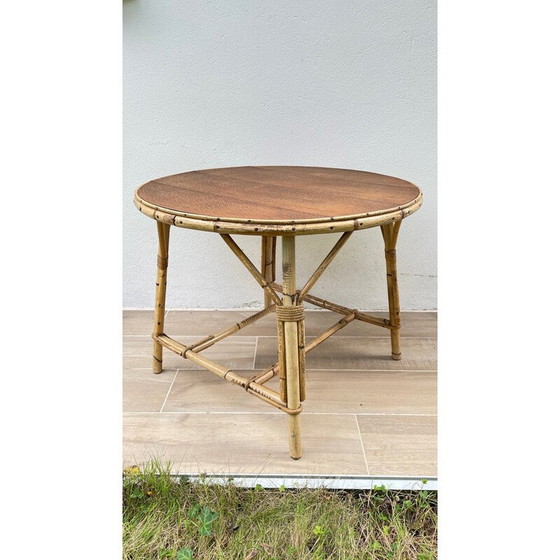 Image 1 of Ronde vintage salontafel van rotan en eiken