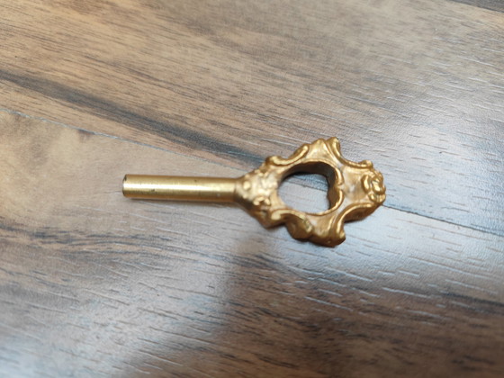 Image 1 of Enorme, rijk versierde pendule, messing, erfstuk