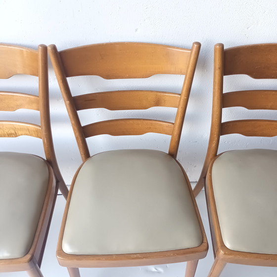 Image 1 of 4x vintage houten stoelen