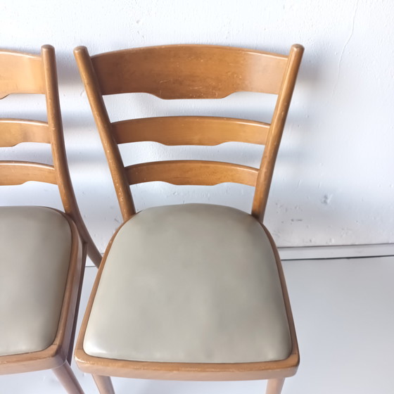 Image 1 of 4x vintage houten stoelen