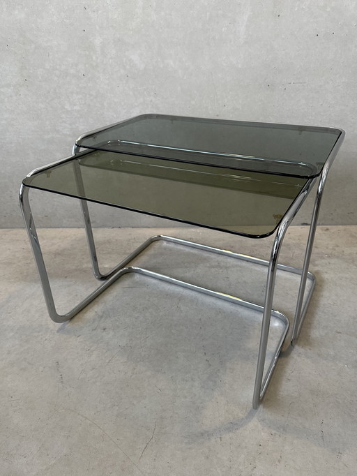 2 glazen bijzettafels / nesting tables