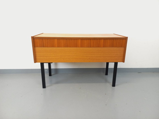 Image 1 of 70s Zwart Teak en metalen opbergkist op poten