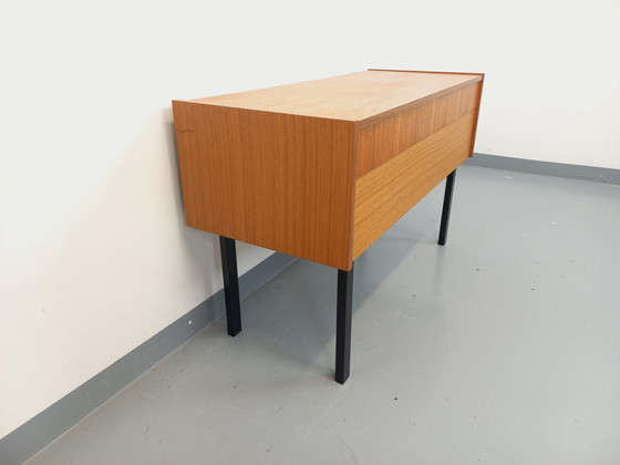 Image 1 of 70s Zwart Teak en metalen opbergkist op poten