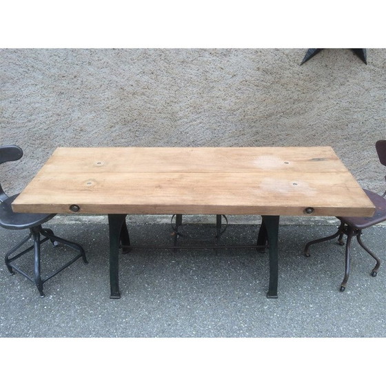 Image 1 of Vintage industriële werkplaatstafel met gietijzeren onderstel, 1910