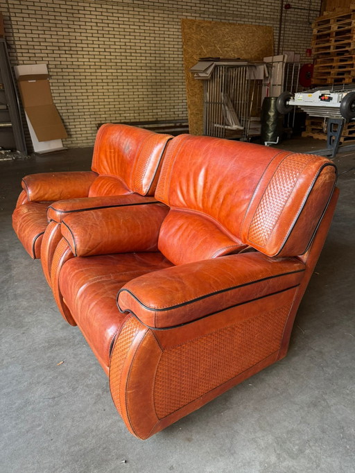 2x Vintage Leren Fauteuils