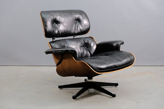 Image 1 of Mid-eeuwse leren fauteuil van Charles & Ray Eames voor Vitra