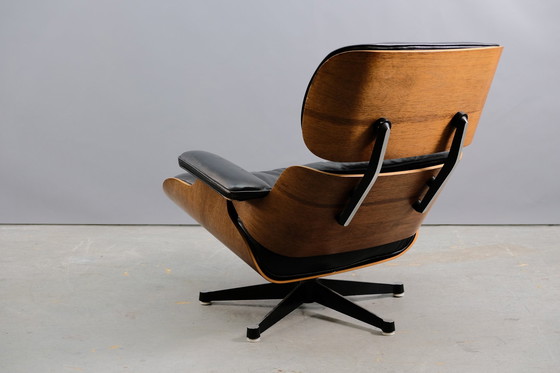 Image 1 of Mid-eeuwse leren fauteuil van Charles & Ray Eames voor Vitra