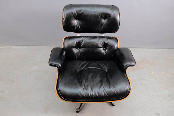 Image 1 of Mid-eeuwse leren fauteuil van Charles & Ray Eames voor Vitra