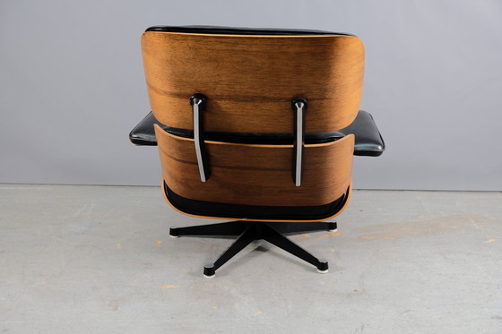 Image 1 of Mid-eeuwse leren fauteuil van Charles & Ray Eames voor Vitra