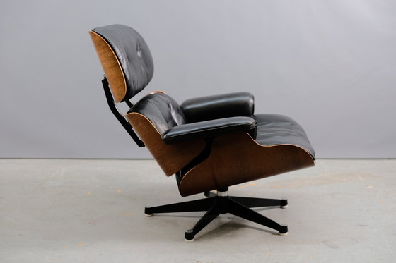 Image 1 of Mid-eeuwse leren fauteuil van Charles & Ray Eames voor Vitra