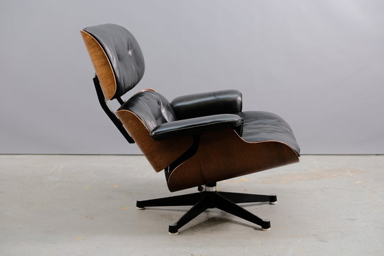 Image 1 of Mid-eeuwse leren fauteuil van Charles & Ray Eames voor Vitra