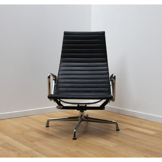 Image 1 of Vintage EA124 bureaustoel in chroom aluminium en leer van Charles en Ray Eames voor Vitra