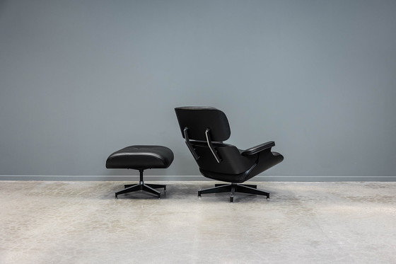 Image 1 of Eames lounge stoel+ voetenbank