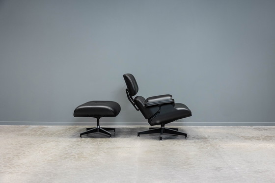 Image 1 of Eames lounge stoel+ voetenbank