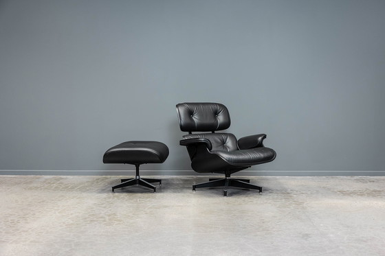 Image 1 of Eames lounge stoel+ voetenbank