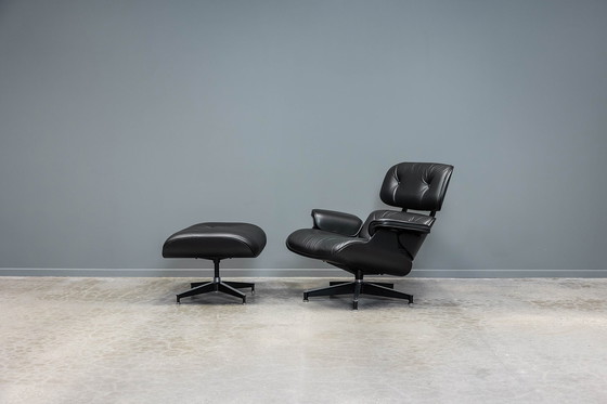 Image 1 of Eames lounge stoel+ voetenbank