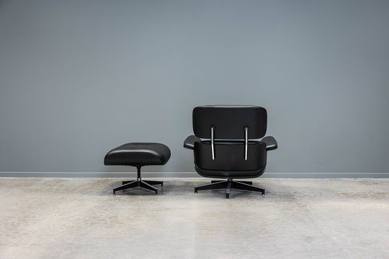 Image 1 of Eames lounge stoel+ voetenbank