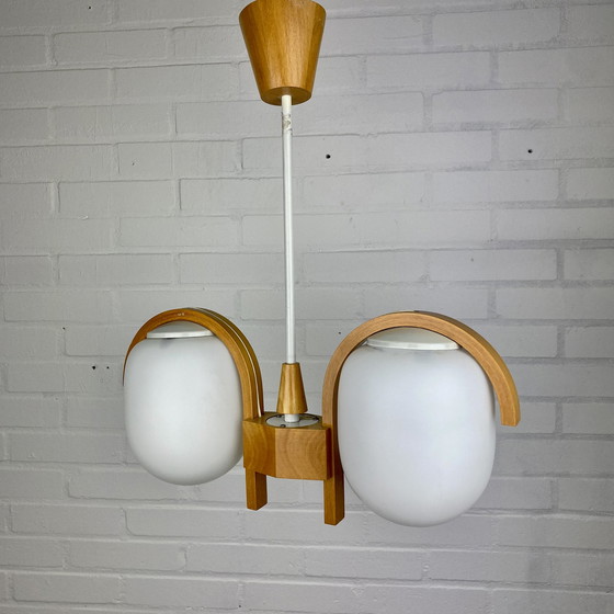 Image 1 of Bow teak hanglamp met opel glas