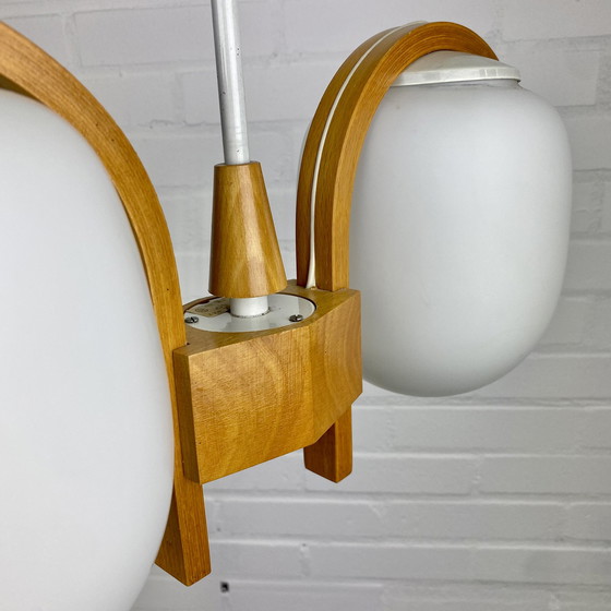 Image 1 of Bow teak hanglamp met opel glas