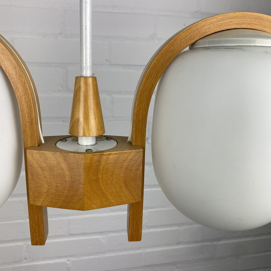 Image 1 of Bow teak hanglamp met opel glas