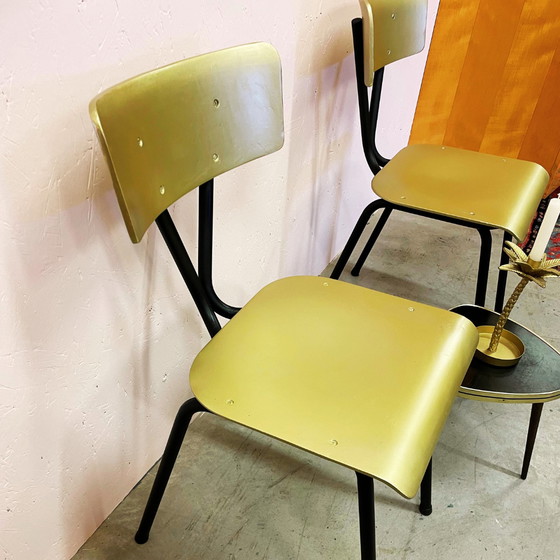 Image 1 of 2x  vintage gouden stapelbare schoolstoelen - 2 stuks