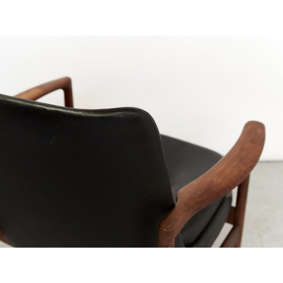 Image 1 of Vintage fauteuil in massief hout en zwart leer van Ib Kofod Larsen voor Fröscher