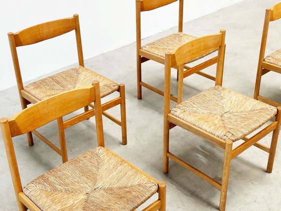 Image 1 of Set van zes Scandinavische rotan en eiken eetkamerstoelen