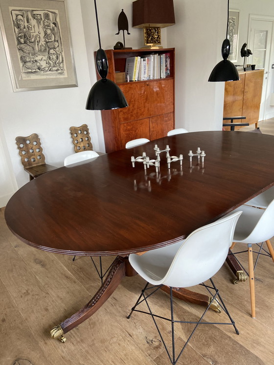 Image 1 of Vintage ovalen eettafel volhout mahonie