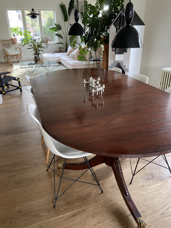 Image 1 of Vintage ovalen eettafel volhout mahonie