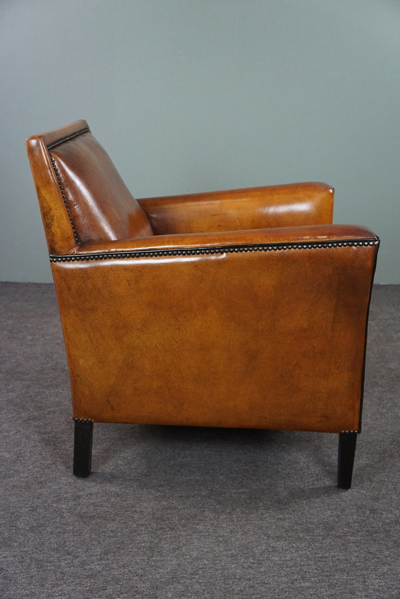 Image 1 of Art Deco fauteuil met zwarte biezen en siernagels