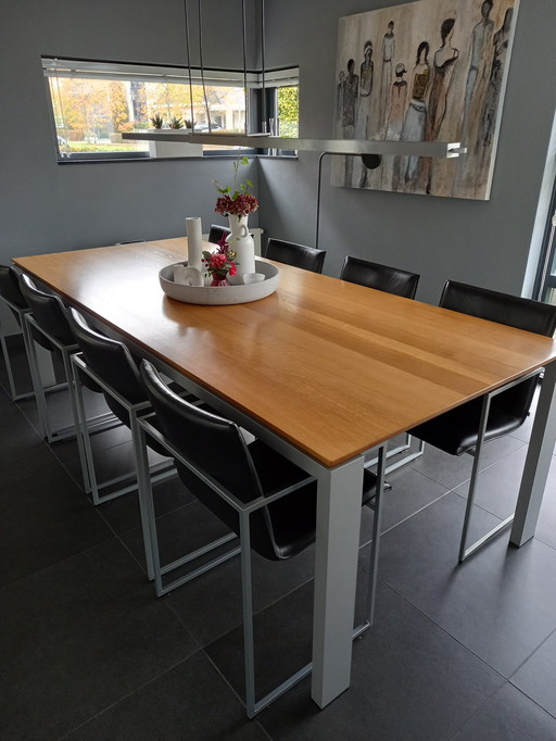 8X Arco Frame Eetkamerstoel + Eettafel Arco Graphic Massief Eiken