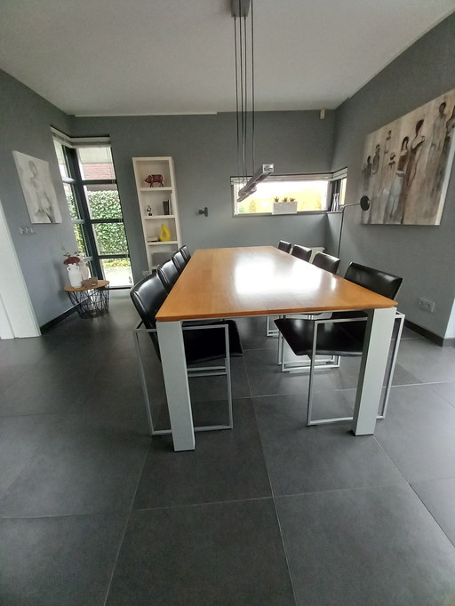 8X Arco Frame Eetkamerstoel + Eettafel Arco Graphic Massief Eiken