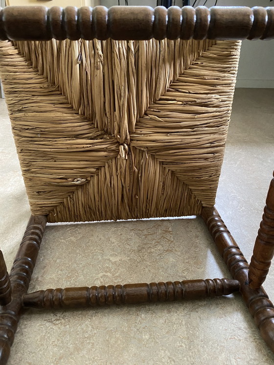 Image 1 of Vintage driehoek stoeltje met biezen zitting