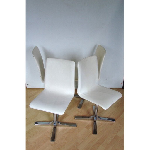 Set van 4 vintage draaistoelen in chroom metaal en leer, 1990