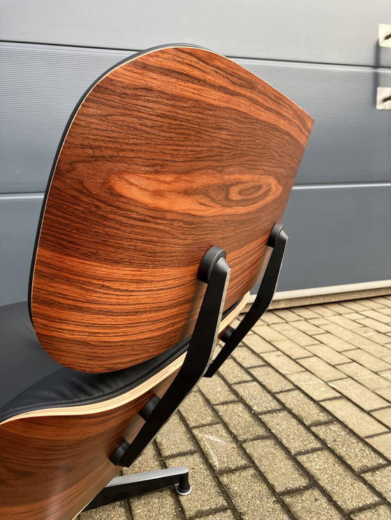 Image 1 of Herman Miller Eames lounge chair + Ottoman Santos Palissander Nieuwstaat!!