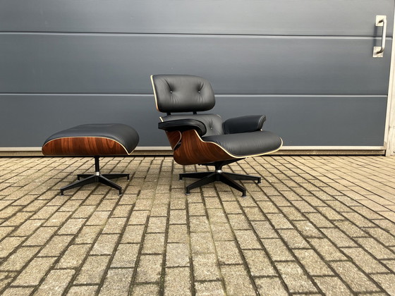 Image 1 of Herman Miller Eames lounge chair + Ottoman Santos Palissander Nieuwstaat!!