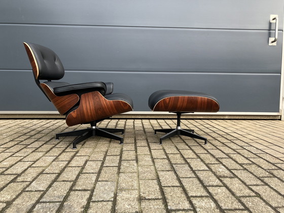 Image 1 of Herman Miller Eames lounge chair + Ottoman Santos Palissander Nieuwstaat!!