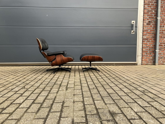 Image 1 of Herman Miller Eames lounge chair + Ottoman Santos Palissander Nieuwstaat!!