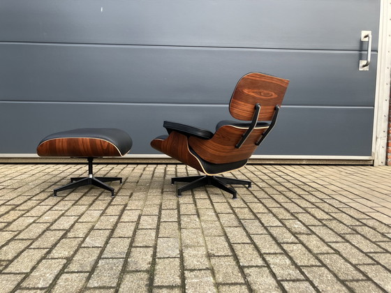 Image 1 of Herman Miller Eames lounge chair + Ottoman Santos Palissander Nieuwstaat!!