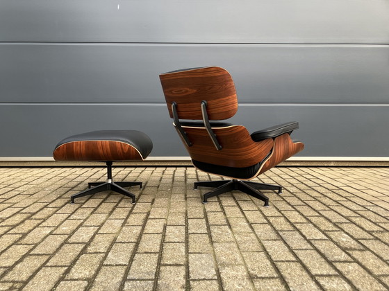 Image 1 of Herman Miller Eames lounge chair + Ottoman Santos Palissander Nieuwstaat!!