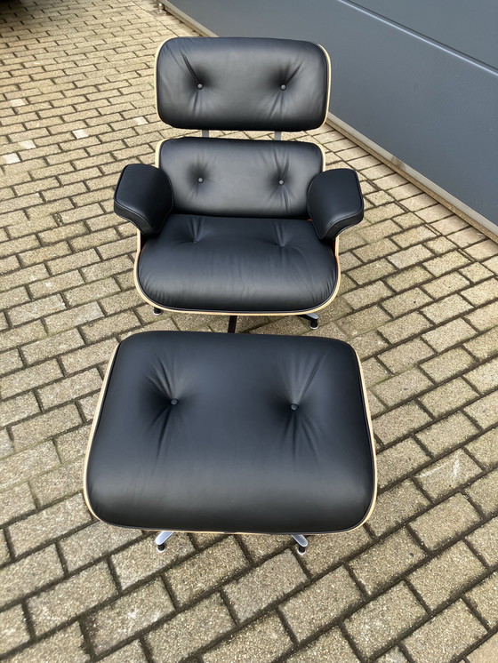 Image 1 of Herman Miller Eames lounge chair + Ottoman Santos Palissander Nieuwstaat!!