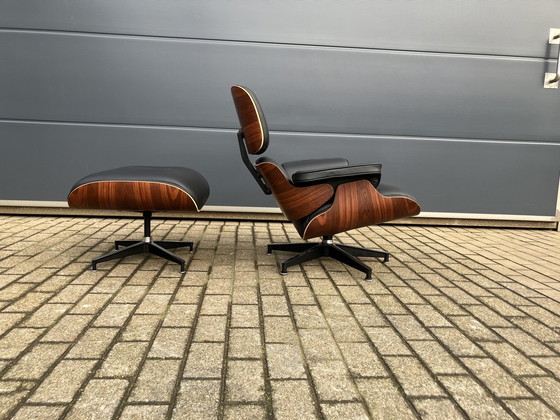 Image 1 of Herman Miller Eames lounge chair + Ottoman Santos Palissander Nieuwstaat!!