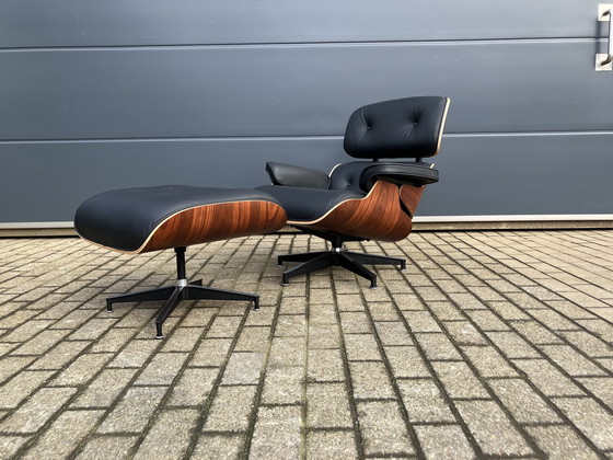 Image 1 of Herman Miller Eames lounge chair + Ottoman Santos Palissander Nieuwstaat!!