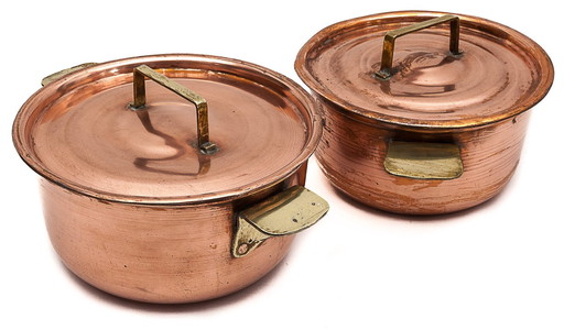 Paar koperen pannen